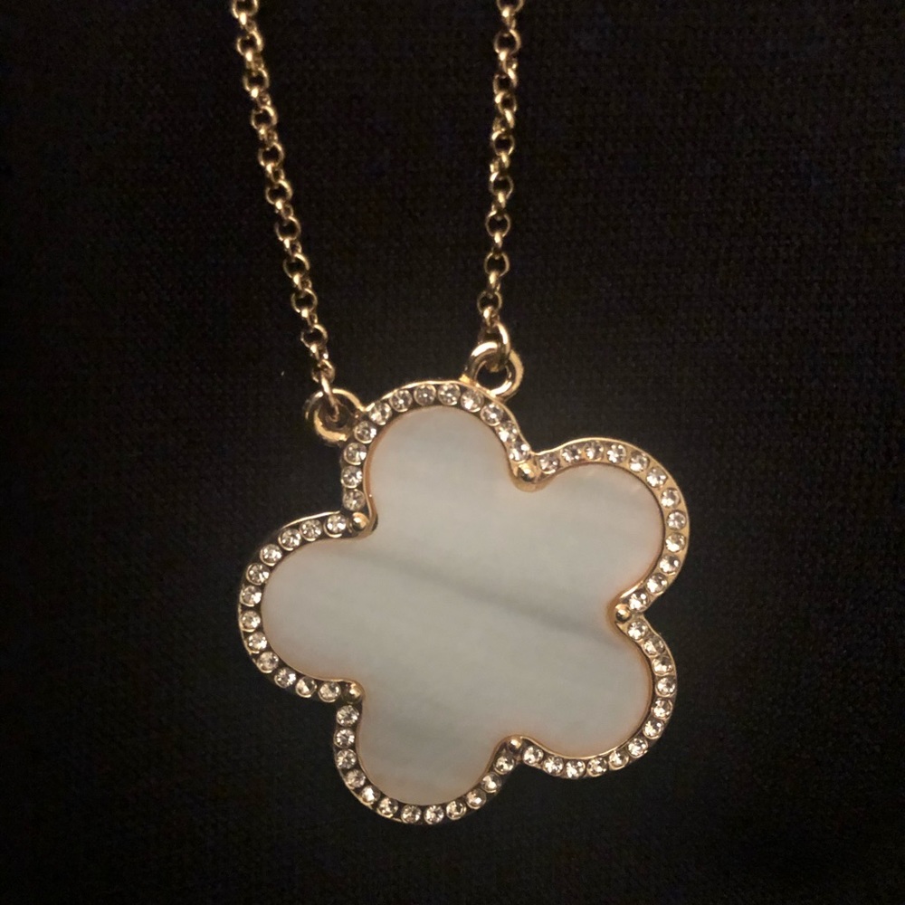 large clover in cream, rhinestone stone in gold
